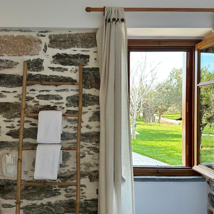Апартаменты Peristerionas Estate Каристос Экстерьер фото